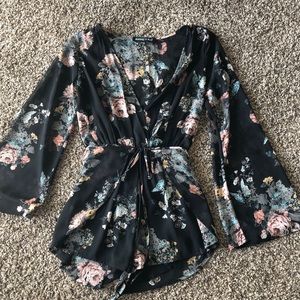 Black floral romper size SMALL